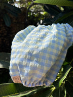 Paraorecchie in cotone seersucker