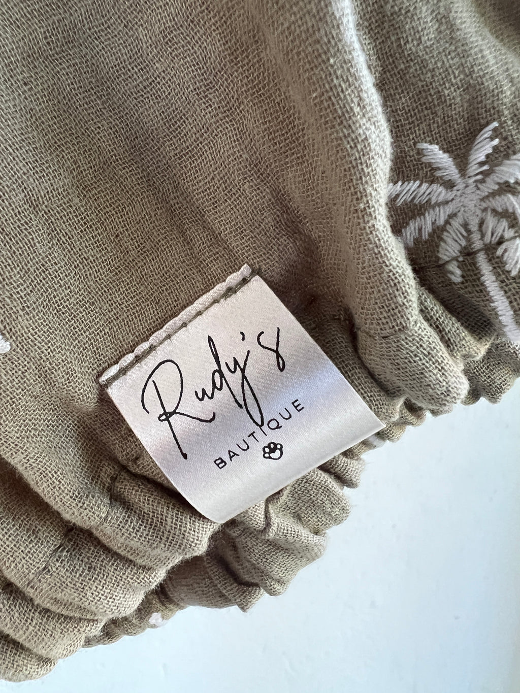 Paraorecchie in Mussola Palme