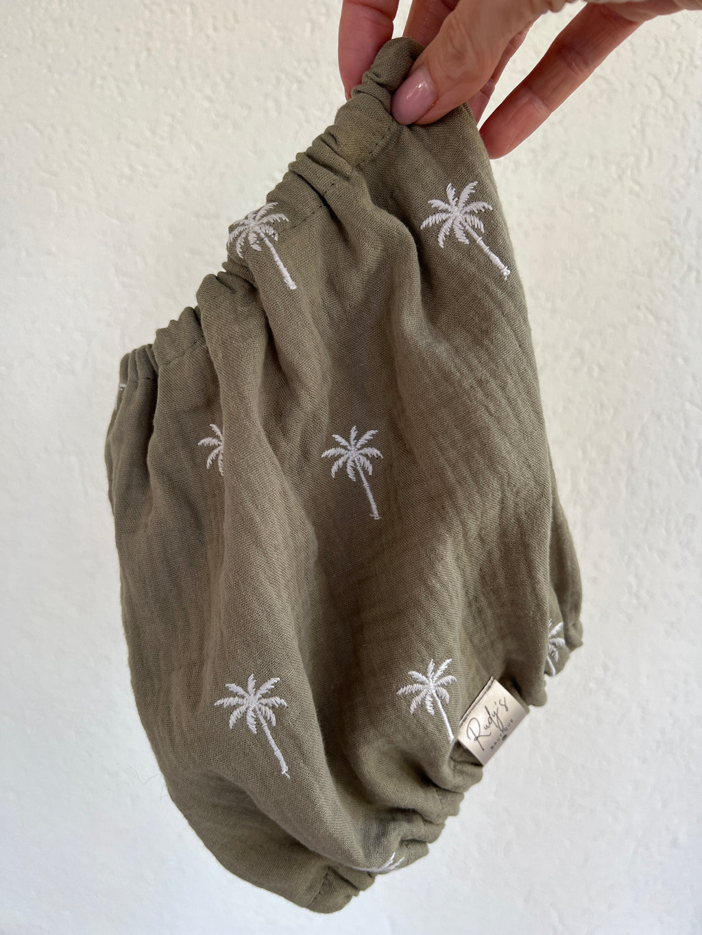 Paraorecchie in Mussola Palme