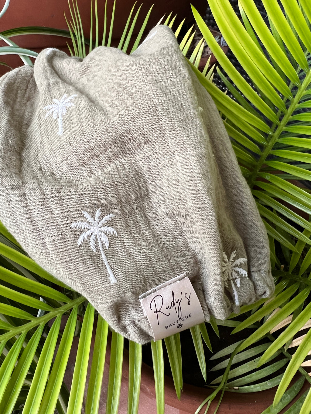 Paraorecchie in Mussola Palme