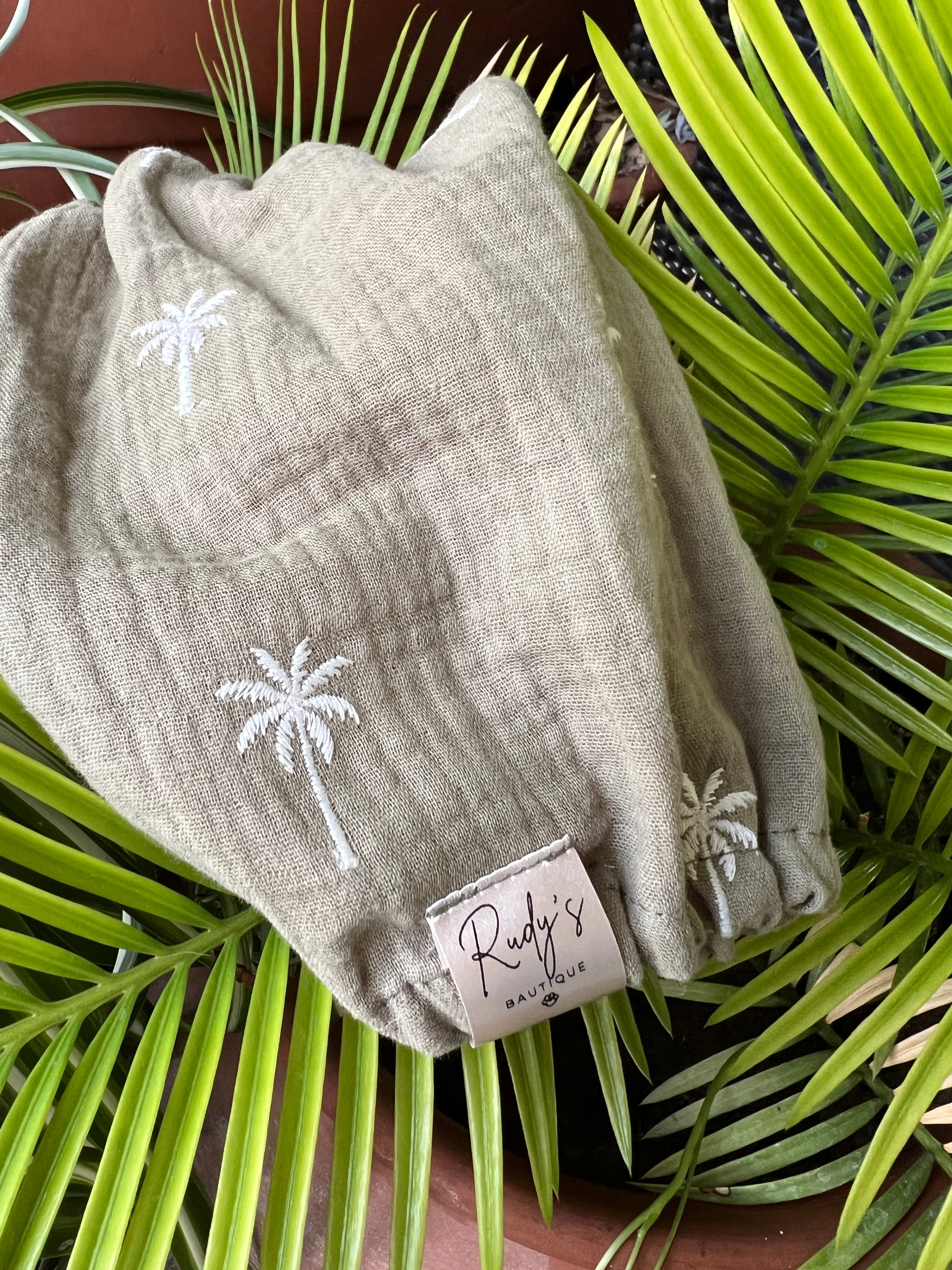 Paraorecchie in Mussola Palme