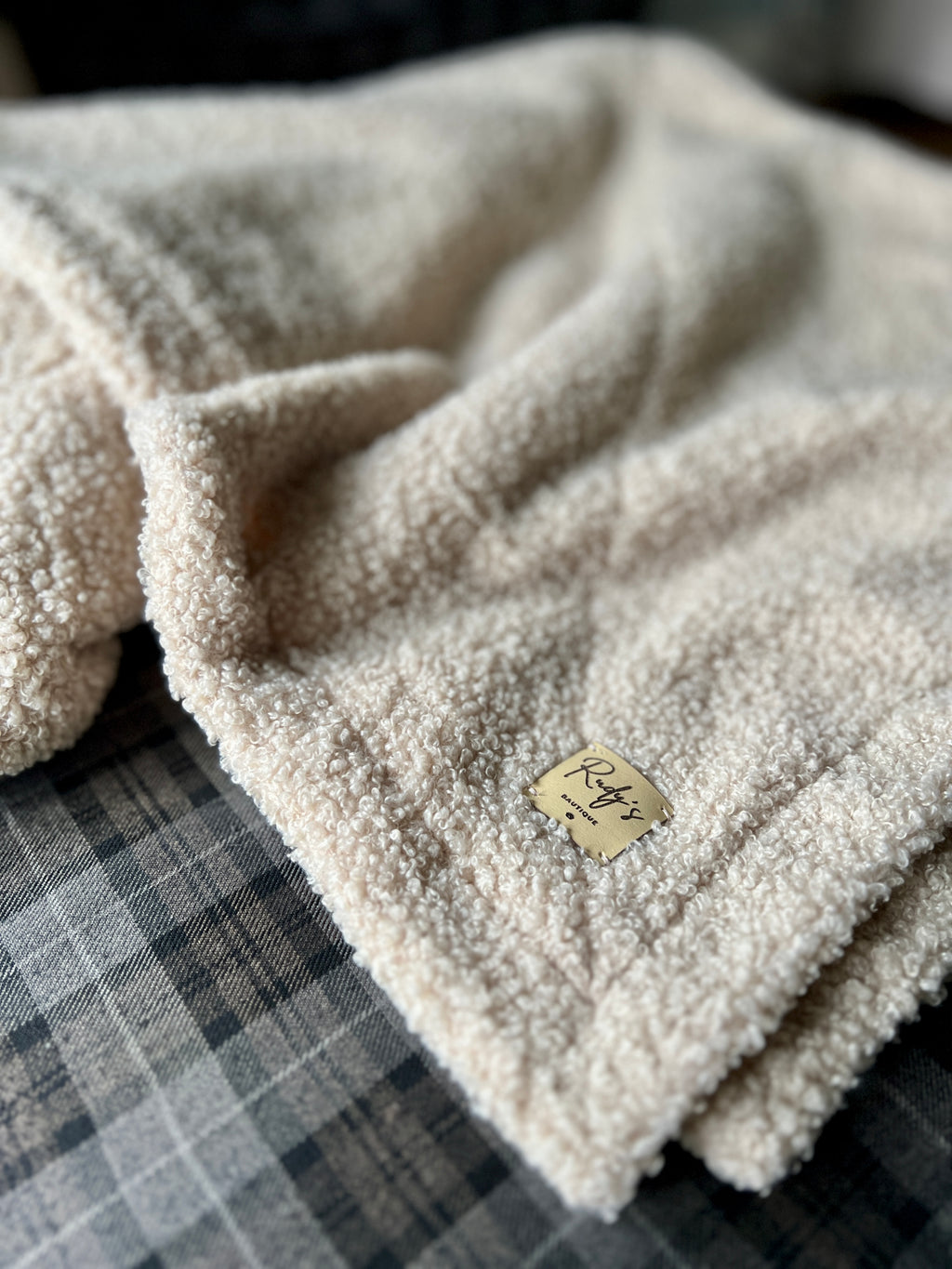 Morbida coperta in teddy bouclè