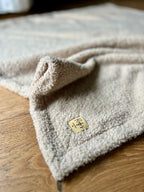 Morbida coperta in teddy bouclè