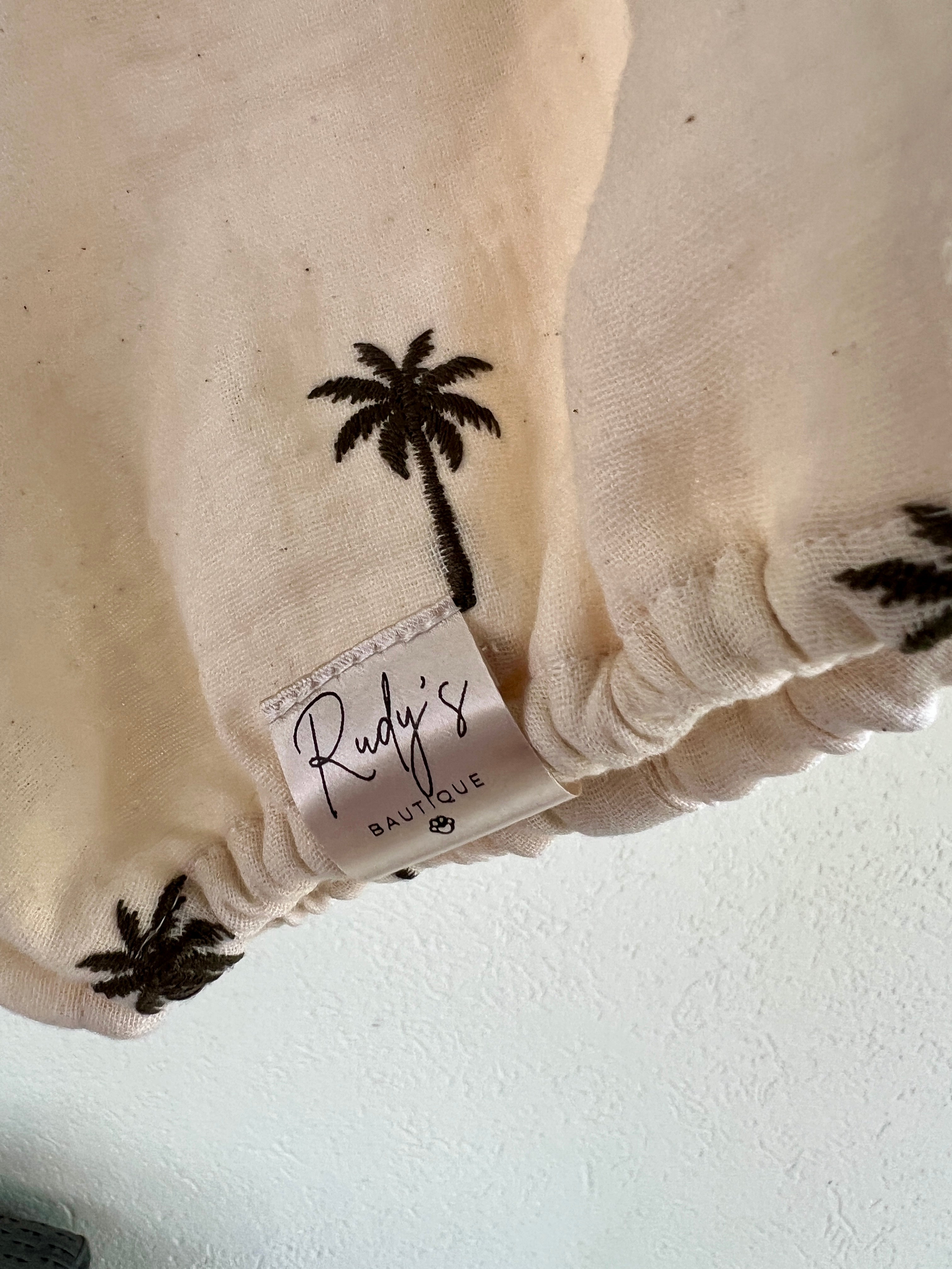 Paraorecchie in Mussola Palme