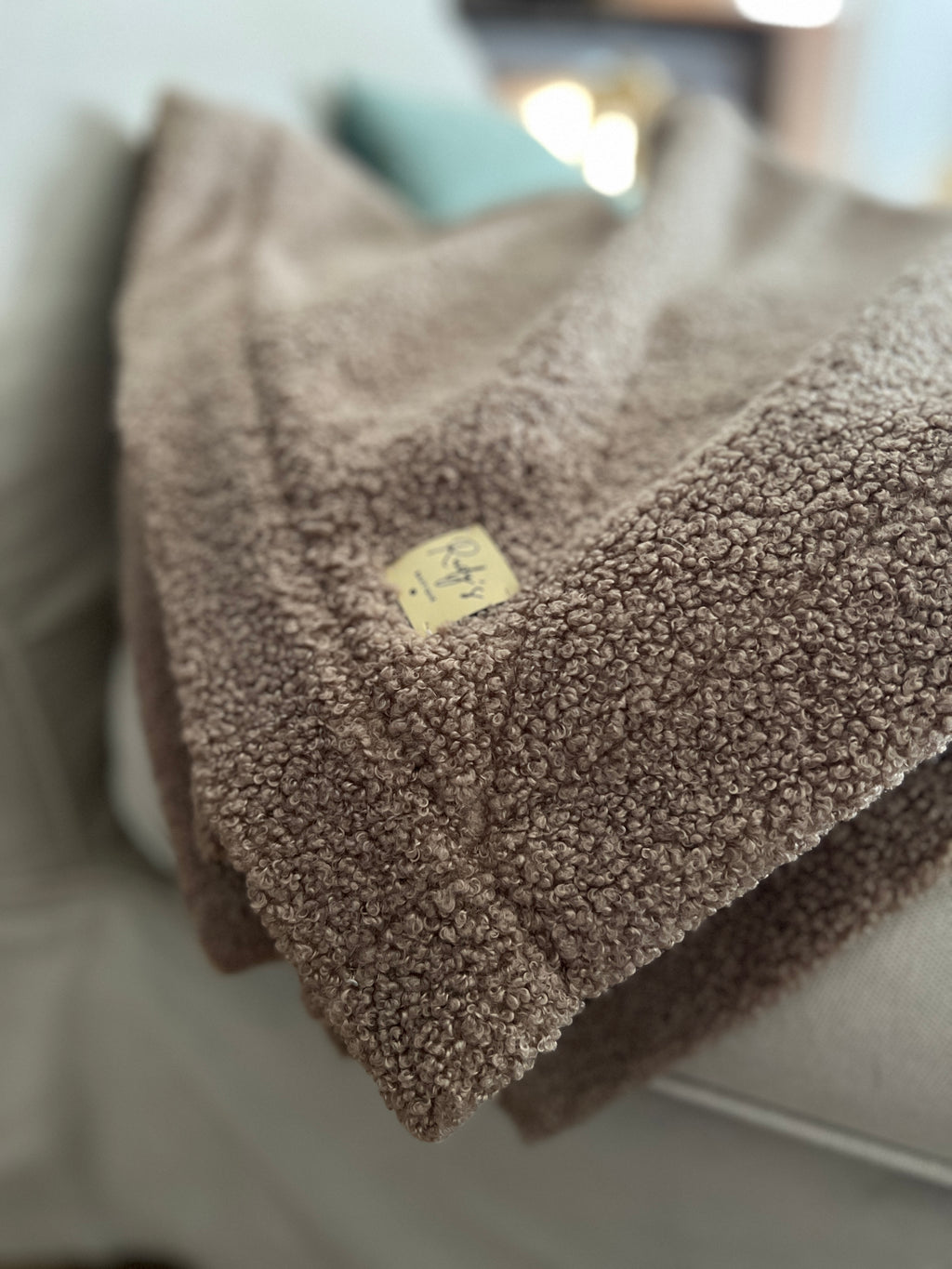 Morbida coperta in teddy bouclè