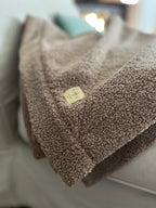 Morbida coperta in teddy bouclè